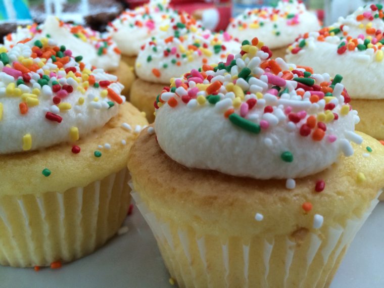 close up birthday cupcakes with sprinkles