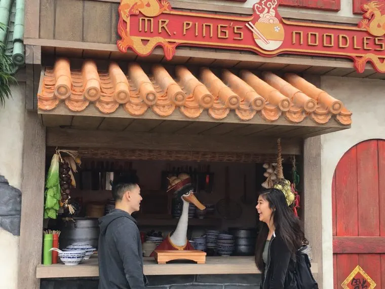 couple meeting Mr. Ping at the Noodle shop for Lunar New Year at Universal Studios Hollywood