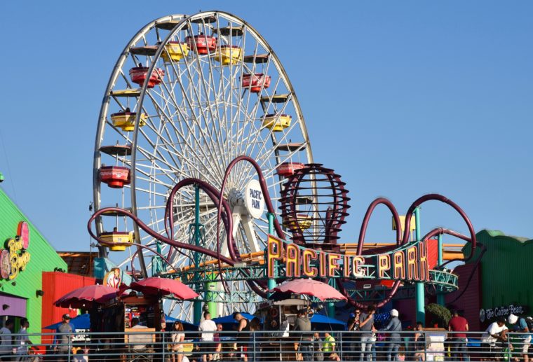 The Santa Monica Pier showing the giant ferris wheel and Pacific Park
