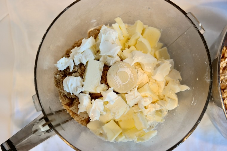 Milky Way apple crisp recipe with cream cheese in mixing bowl