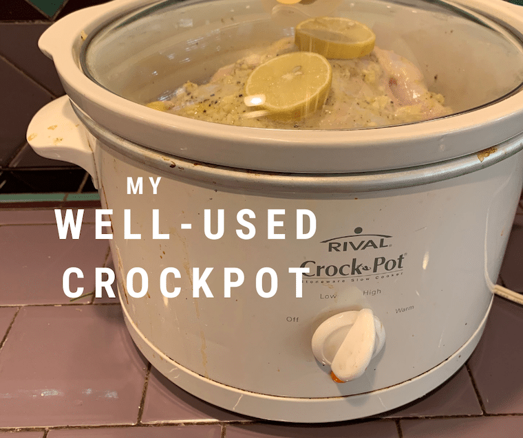 a well used crock pot making dinner