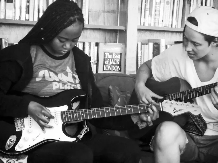 Amplify Sleep Away Camp 2 girls playing guitar