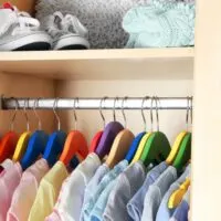 kids clothes in a closet - featured image