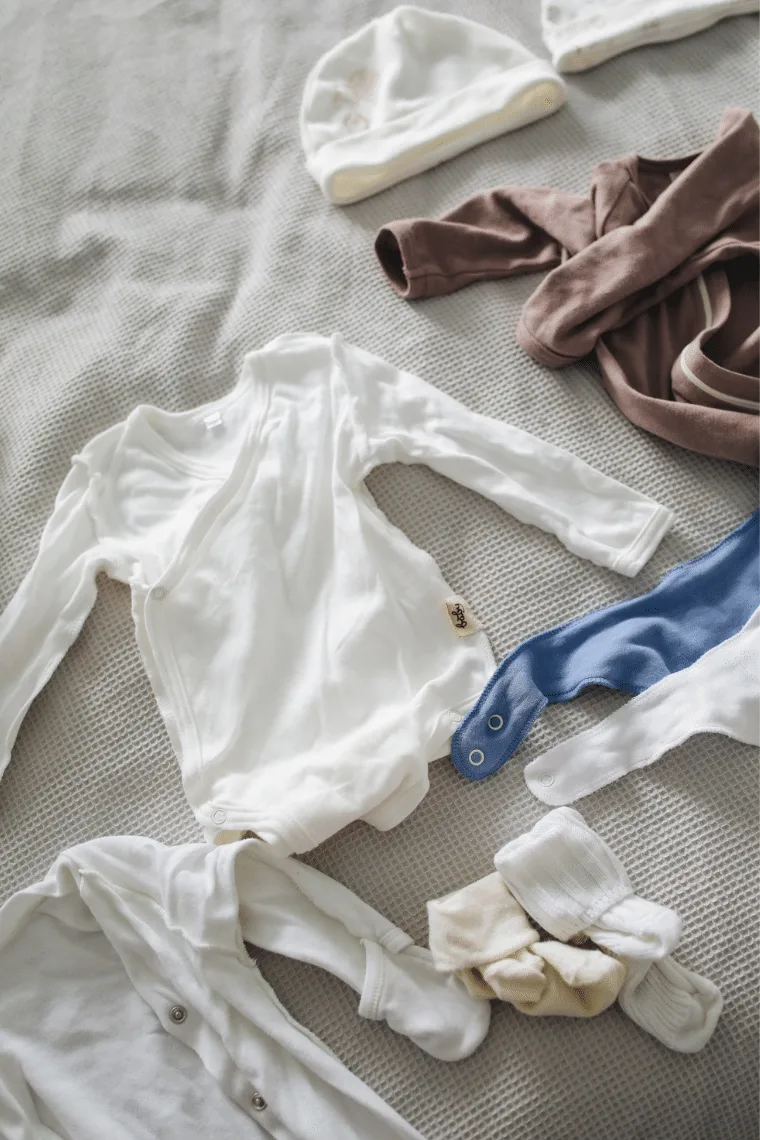 flat lay of baby clothes