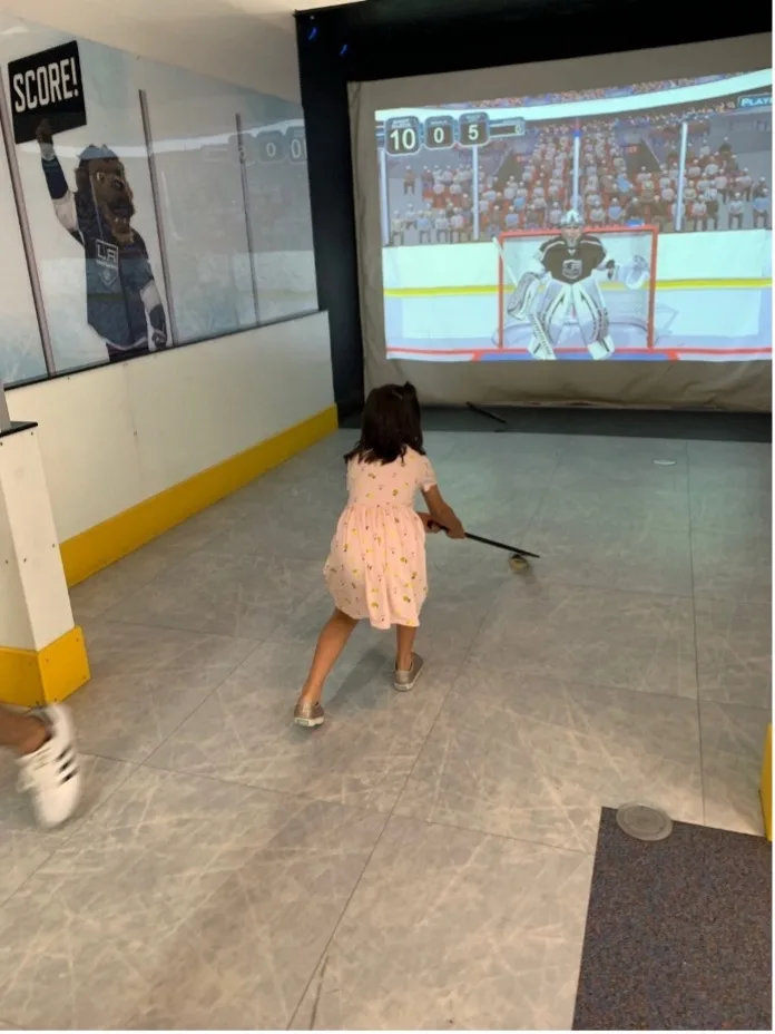 Learning to play hockey at the Discovery Cube Los Angeles