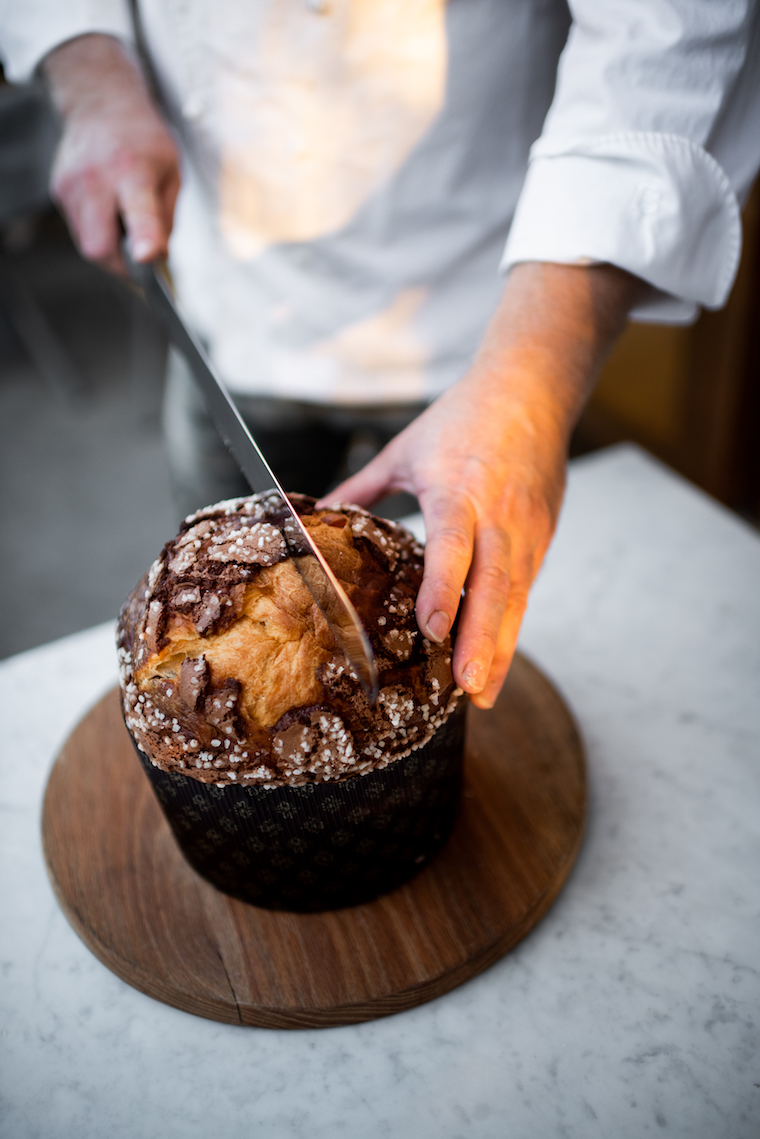 About to slice into the Panettone bread at Bianca, photo credit Ximena Etchart