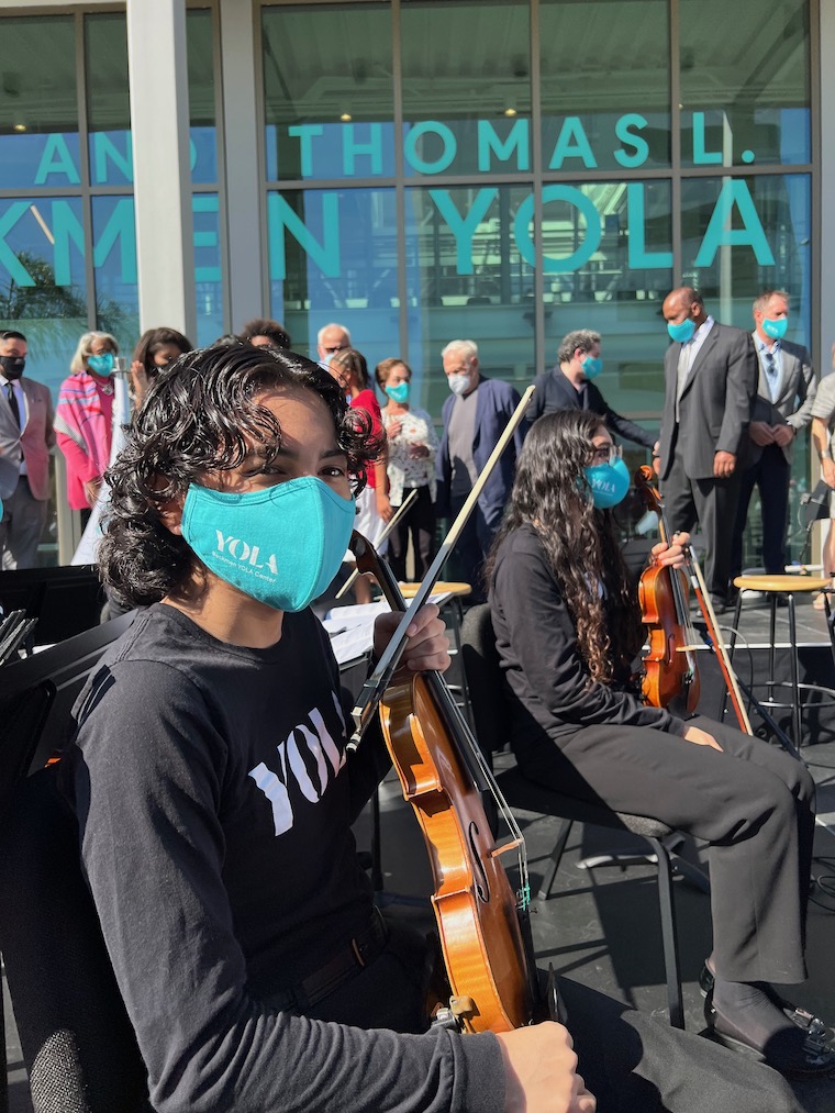 Violin player in the LA Phil's Youth Orchestra Los Angeles at opening of Beckman YOLA Center