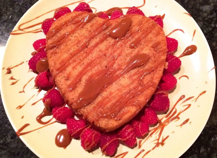 heart shaped cake with raspberries for valentine's day