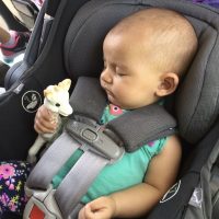 Sleeping-Baby-in-a-car-seat-holding-a-favorite-toy