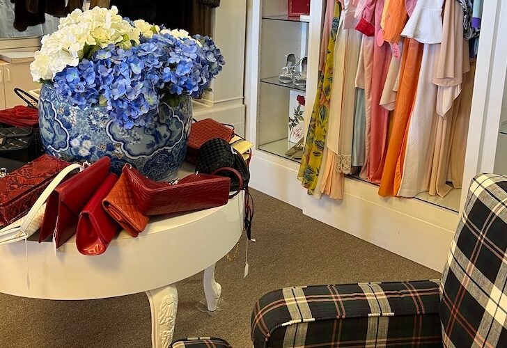 Colleagues thrift store with clothes, handbags, and chair featured image