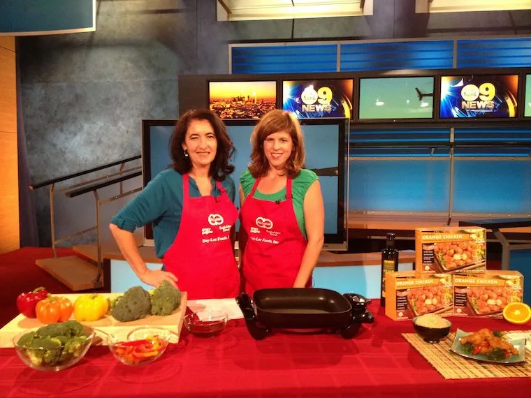 MomsLA co-Founders Sarah Auerswald and Yvonne Condes on the set of CBS LA/KCAL 9 News