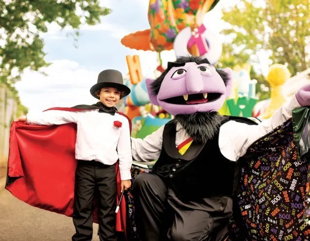 The count and a young boy dressed at the count at Sesame Place San Diego
