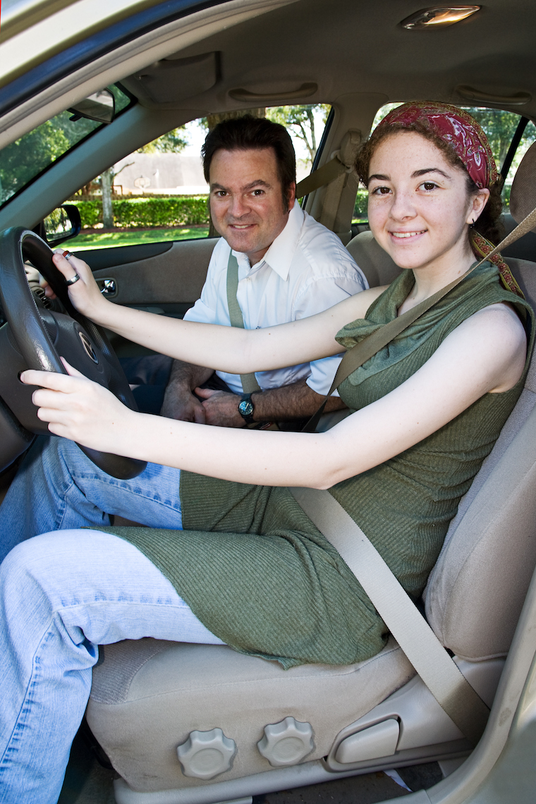 teen girl and and instructor in the car and ready to drive