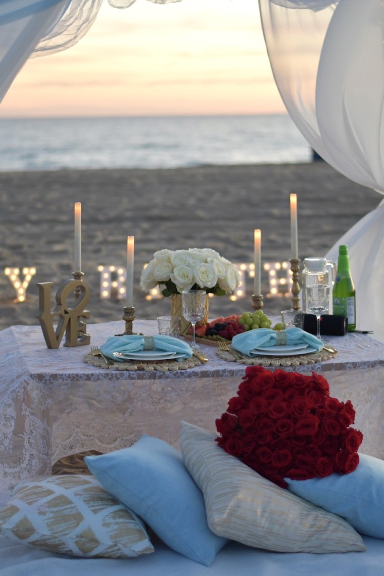beautiful, romantic picnic on the beach was created by Moon Flower Events