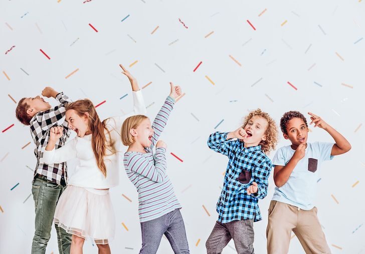 kids singing and dancing at a kids' party