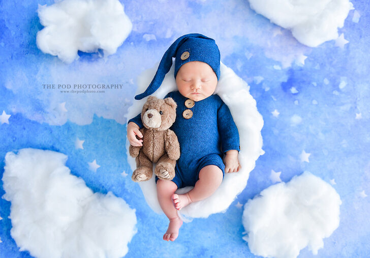 baby-asleep-in-the-clouds-by-The-Pod-Photography