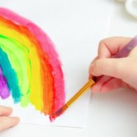child painting a rainbow kids artwork