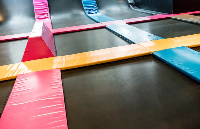 Interconnected trampolines for indoor jumping. 