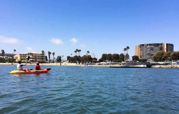 wide shot of kayaking in Marina del Rey seeing Mother's Beach