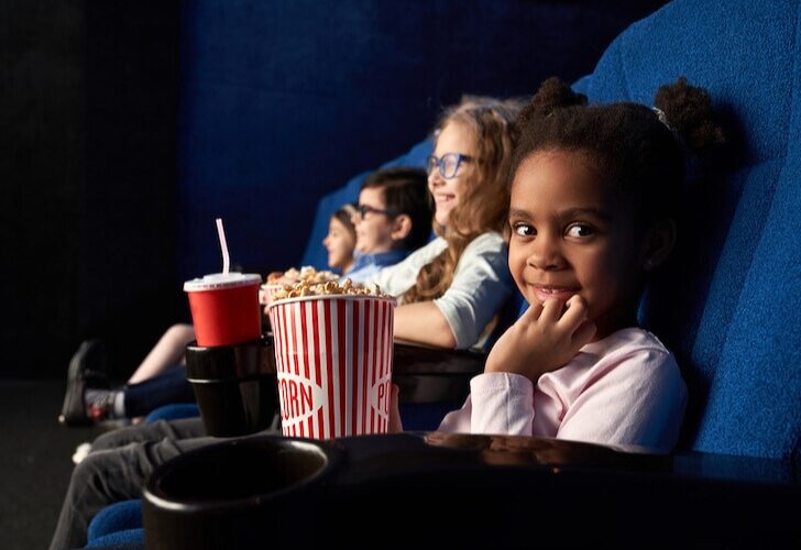 kids having fun in a movie theater