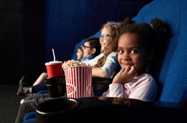 kids having fun in a movie theater