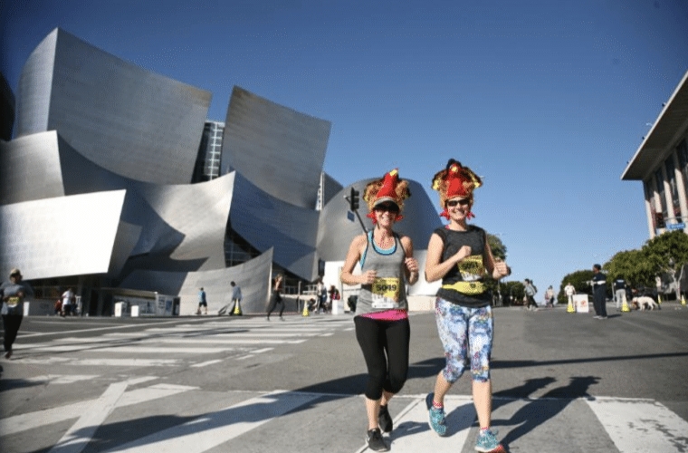runners in front of Disney Hall Turkey Trot Los Angeles